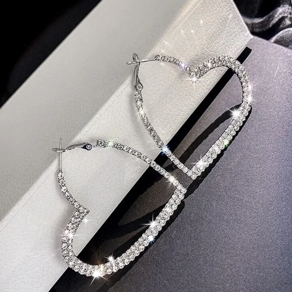 Any 2/$20! Silver Crystal Pave Heart Hoop Earrings - Picture 2 of 7